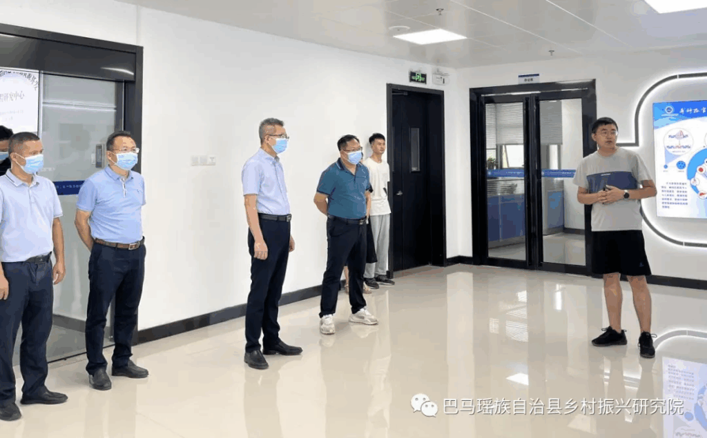 广西壮族自治区政府发展研究中心党组副书记唐毓流一行深入巴马瑶族自治县乡村振兴研究院调研